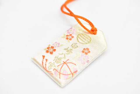 Japanese OMAMORI AMULET CHARM for "Blessed with child treasure" white orange with box from Shirasaki Hachimangu